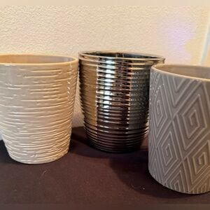 3 ceramic, decorative planters. One is Hallmark. 5.5-5.75”H